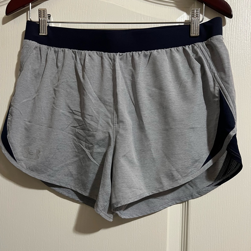 Under Armour loose fit heatgear woman’s size med shorts.